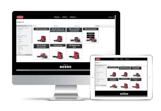 A computer monitor and a tablet display the same truck selection webpage with images and names of different truck models.